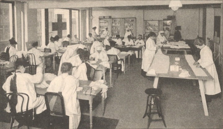 "Throughout the country, in Red Cross chapter, in club, church guild, and small home, women are doing their 'bit' for the soldiers." McCall's Jul 1917 photograph