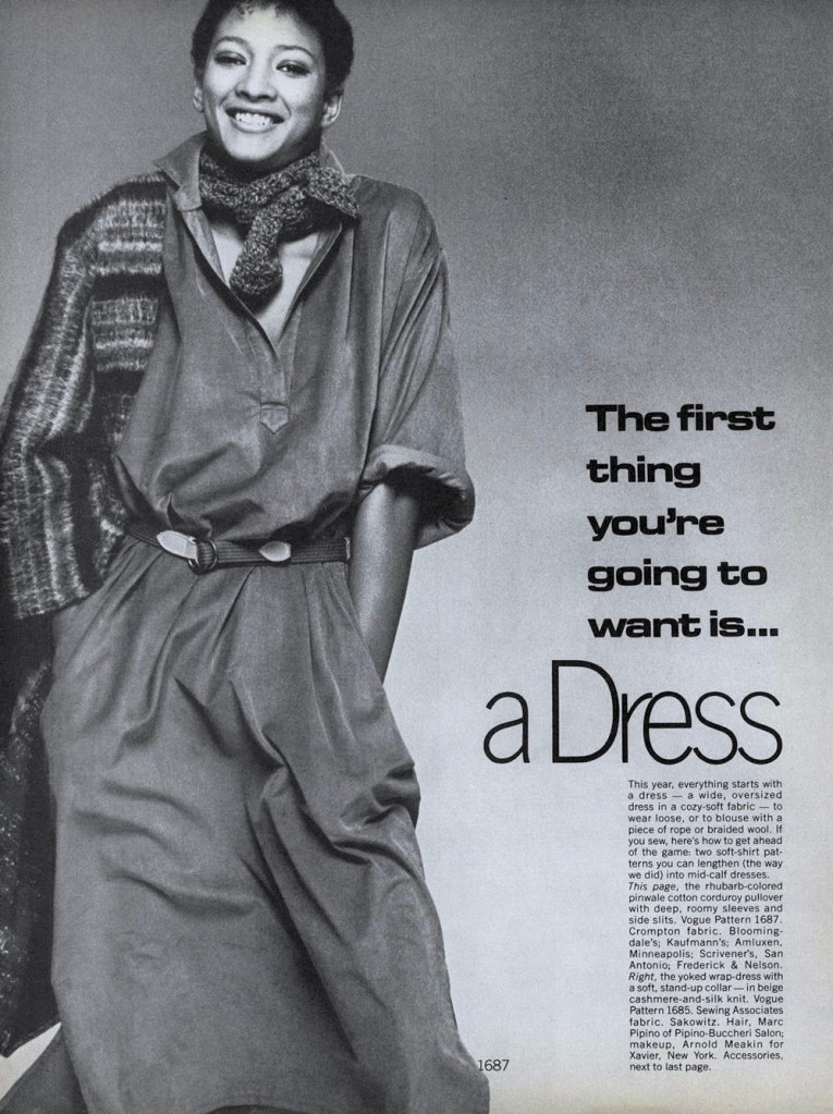 Black and white Vogue editorial photo of a smiling Black model in a belted shirt dress with the headline, "The first thing you're going to want is... a Dress."